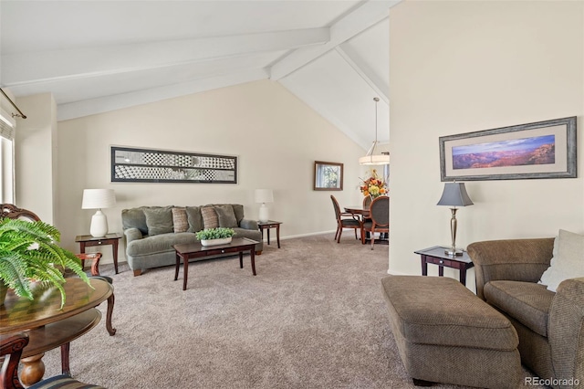 living area with baseboards, carpet floors, high vaulted ceiling, and beam ceiling