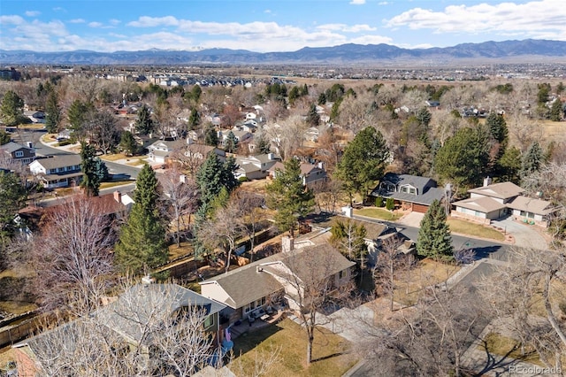 drone / aerial view featuring a mountain view and a residential view