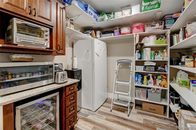 3308 County Road 19, Fort Lupton, CO 80621 - pantry featuring wine cooler
