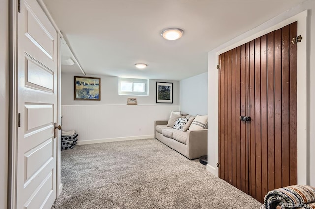 sitting room featuring carpet floors