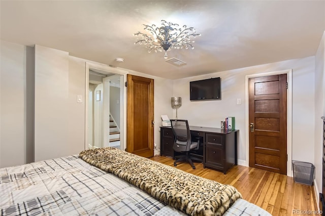 bedroom with light hardwood / wood-style flooring