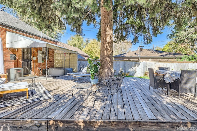 wooden deck featuring central AC