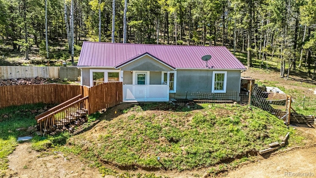 86 Will Stutley Dr, Divide, CO 80814 - view of front of property with metal roof and stucco siding