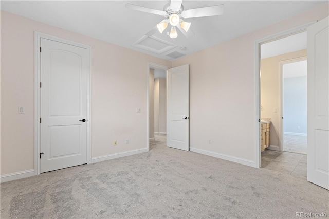 unfurnished bedroom with attic access, light carpet, ceiling fan, and baseboards