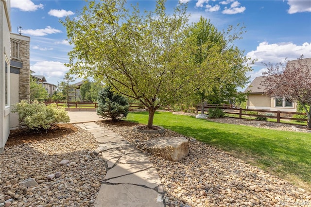 view of yard featuring fence