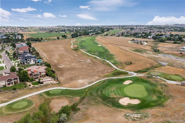 drone / aerial view featuring a residential view and golf course view