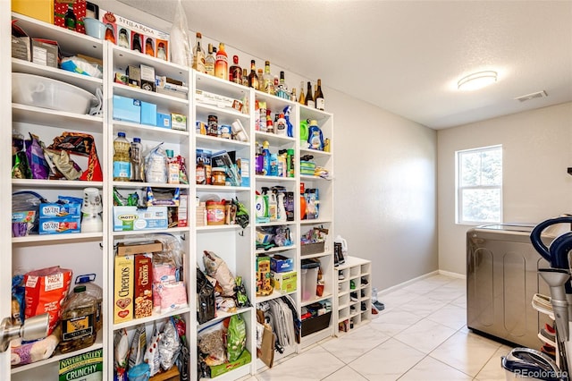 pantry featuring washer / dryer