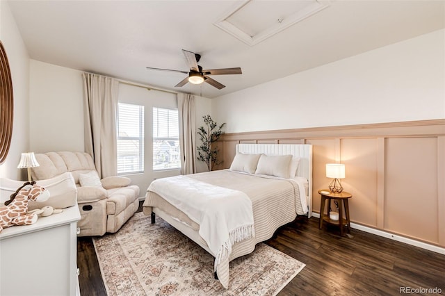 bedroom with ceiling fan and dark hardwood / wood-style floors