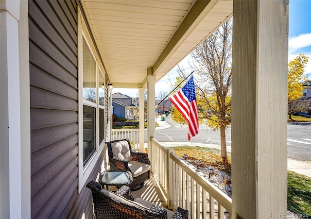 balcony featuring covered porch