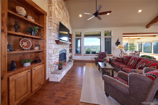 living room featuring dark wood-style floors, a fireplace, a ceiling fan, recessed lighting, and beam ceiling