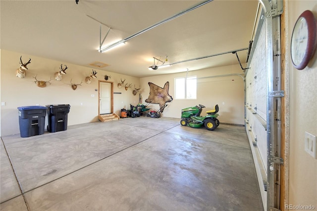 garage featuring a garage door opener
