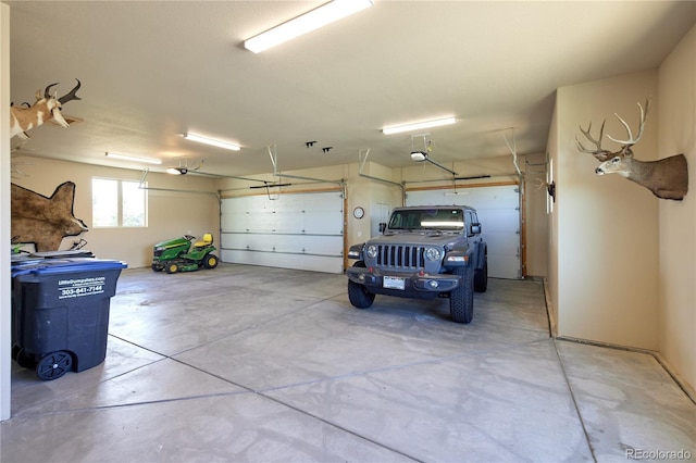 garage featuring a garage door opener