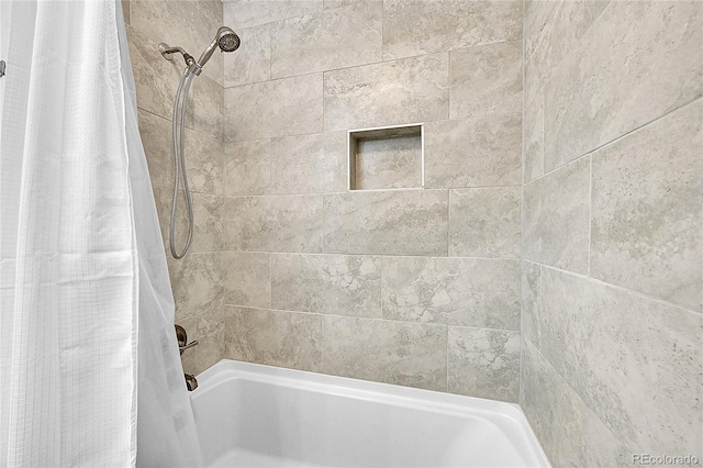 bathroom with shower / tub combo