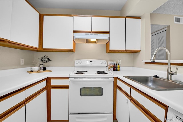 kitchen featuring under cabinet range hood, a sink, white electric stove, visible vents, and white cabinets