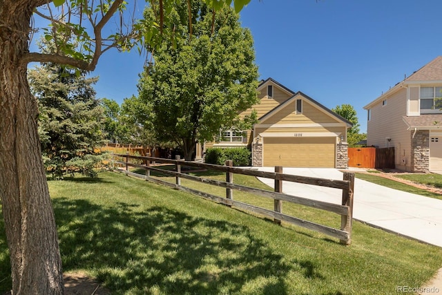 16102 Grebe Pl, Parker, CO 80134 - view of front of property with concrete driveway, stone siding, and a garage