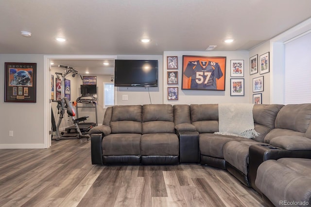 16102 Grebe Pl, Parker, CO 80134 - living room featuring wood finished floors, baseboards, and recessed lighting