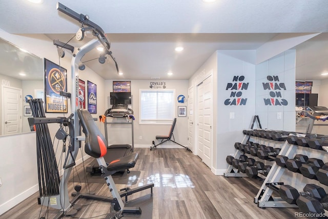 16102 Grebe Pl, Parker, CO 80134 - workout area featuring baseboards, wood finished floors, and recessed lighting