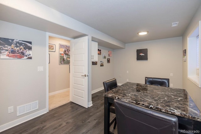 16102 Grebe Pl, Parker, CO 80134 - dining area with dark wood finished floors and baseboards