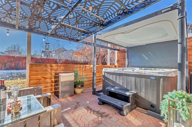 view of patio featuring a hot tub