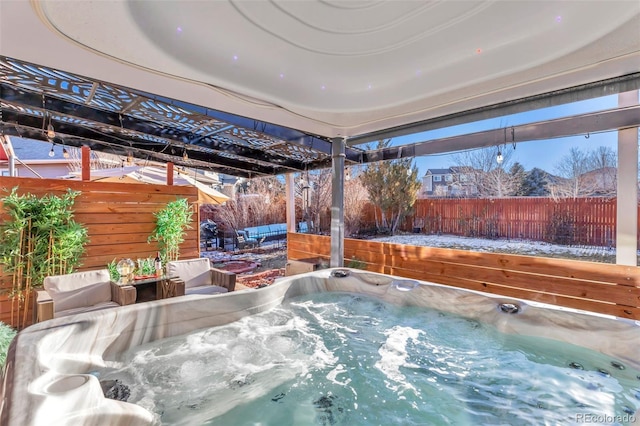 exterior space with a hot tub