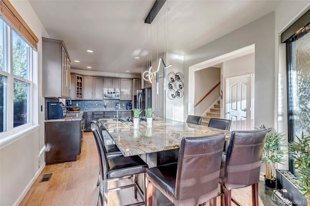 dining space featuring light hardwood / wood-style flooring