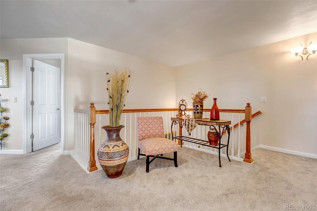 sitting room with light colored carpet