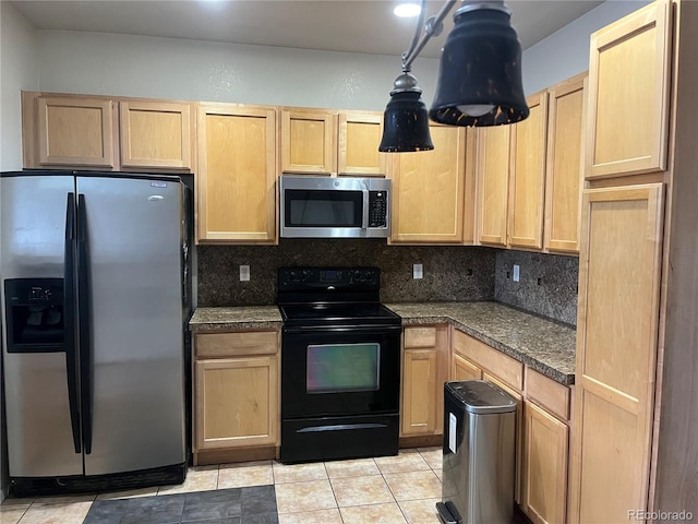 14400 Albrook Dr Unit 88, Denver, CO 80239 - kitchen with stainless steel appliances, light brown cabinetry, dark countertops, and tasteful backsplash
