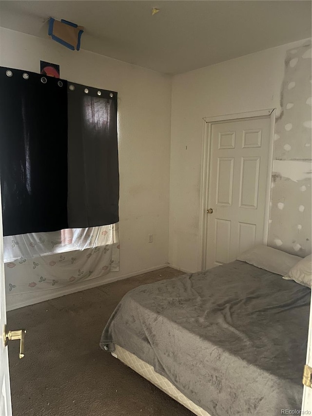 14400 Albrook Dr Unit 88, Denver, CO 80239 - carpeted bedroom with baseboards