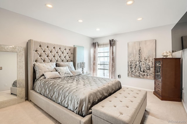 bedroom featuring recessed lighting, baseboards, and light colored carpet