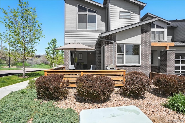 12497 W Virginia Ave, Lakewood, CO 80228 - exterior space with brick siding