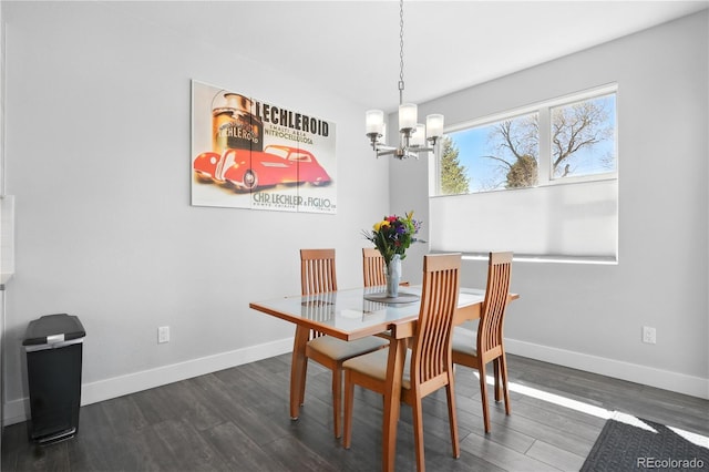 12497 W Virginia Ave, Lakewood, CO 80228 - dining area with a chandelier, dark wood-style floors, and baseboards