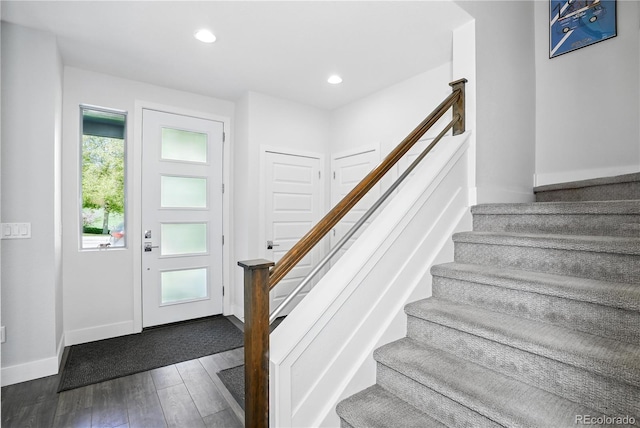 12497 W Virginia Ave, Lakewood, CO 80228 - entryway with wood finished floors, stairway, baseboards, and recessed lighting