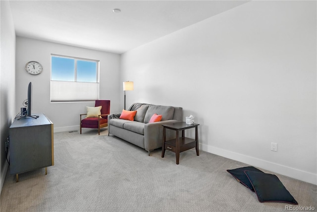 12497 W Virginia Ave, Lakewood, CO 80228 - living room featuring baseboards and carpet floors