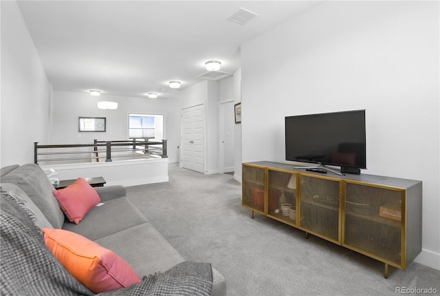 12497 W Virginia Ave, Lakewood, CO 80228 - living area featuring baseboards, visible vents, and carpet floors