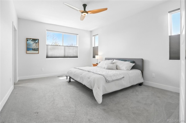 12497 W Virginia Ave, Lakewood, CO 80228 - carpeted bedroom with baseboards and a ceiling fan