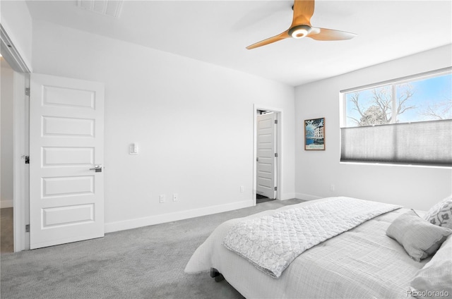 12497 W Virginia Ave, Lakewood, CO 80228 - carpeted bedroom featuring baseboards and ceiling fan