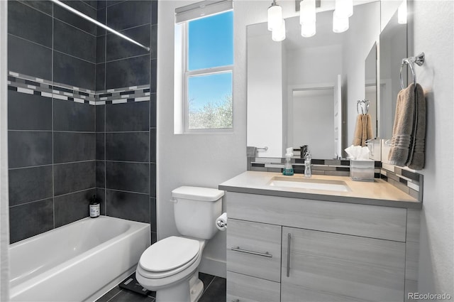 12497 W Virginia Ave, Lakewood, CO 80228 - bathroom featuring vanity, toilet, and  shower combination