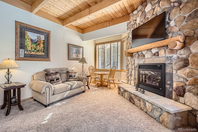 carpeted living room featuring beamed ceiling, wooden ceiling, and a fireplace