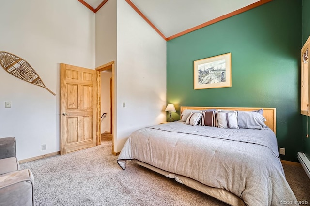 bedroom with crown molding, high vaulted ceiling, carpet floors, and baseboard heating