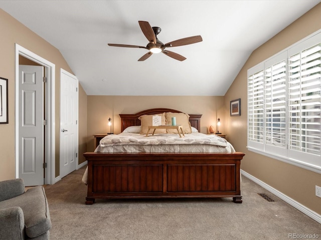 9323 Notts Ct, Lone Tree, CO 80124 - bedroom with vaulted ceiling, light colored carpet, and a ceiling fan