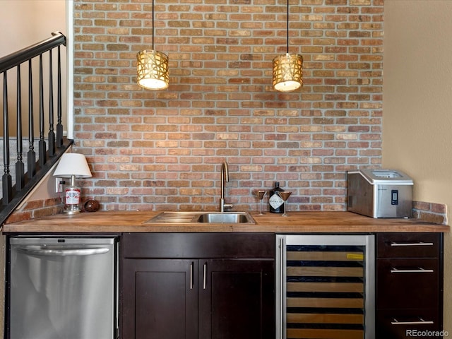 9323 Notts Ct, Lone Tree, CO 80124 - indoor wet bar featuring dishwasher, beverage cooler, decorative light fixtures, and brick wall