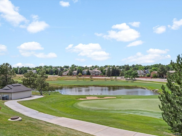 9323 Notts Ct, Lone Tree, CO 80124 - view of home's community featuring a water view, a lawn, and golf course view