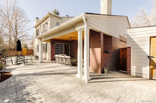 view of patio featuring a ceiling fan