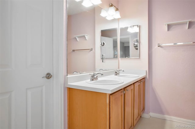 bathroom with vanity and tile patterned floors