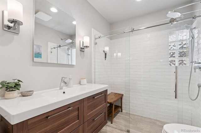 3154 N Columbine St, Denver, CO 80205 - bathroom featuring vanity, a stall shower, and recessed lighting