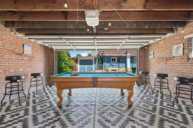 3154 N Columbine St, Denver, CO 80205 - game room with brick wall, a garage, pool table, and carpet