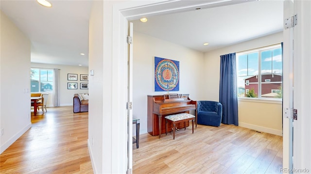 55 Morgan Cir, Erie, CO 80516 - living area with light wood finished floors and recessed lighting