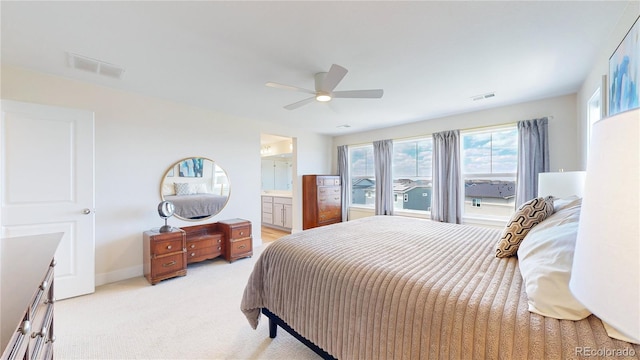 55 Morgan Cir, Erie, CO 80516 - bedroom with light colored carpet, ensuite bathroom, and a ceiling fan