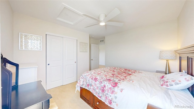 55 Morgan Cir, Erie, CO 80516 - bedroom featuring attic access, light colored carpet, a closet, and ceiling fan