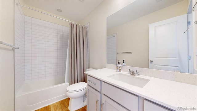 55 Morgan Cir, Erie, CO 80516 - bathroom featuring vanity, wood finished floors, and shower / bath combination with curtain